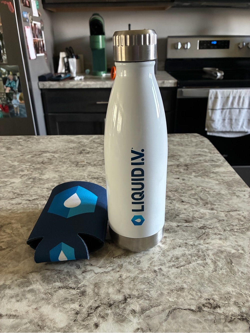 Liquid iv bottle and coozie